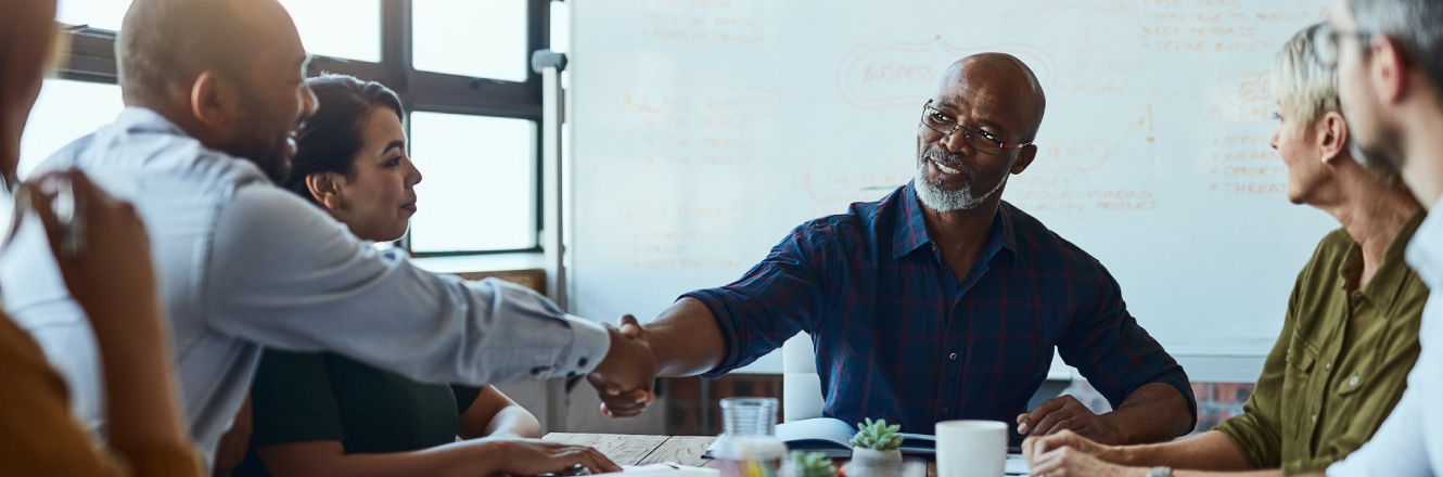 handshake during a business meeting