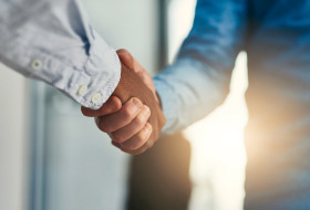 Two people shaking hands