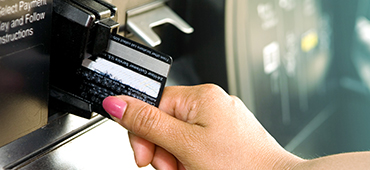 Swiping card at gas station