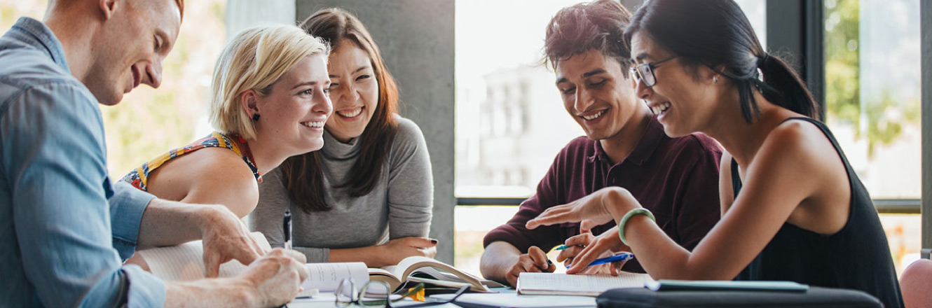 group of students laughing and talking