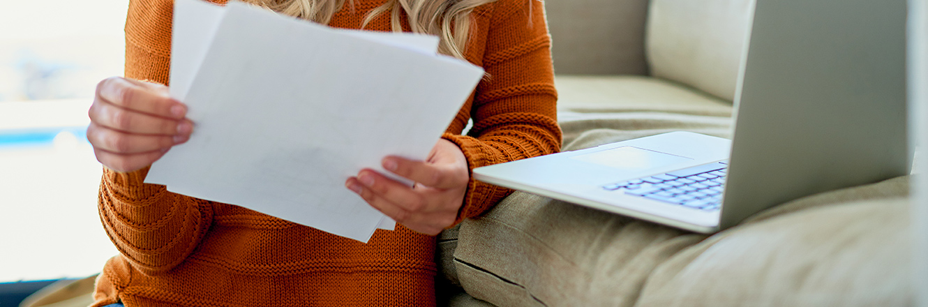 woman looking at papers