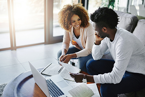 couple sitting at computer