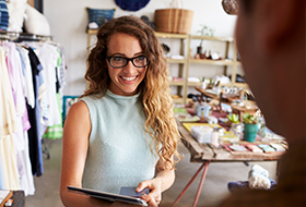 woman business owner talking to client