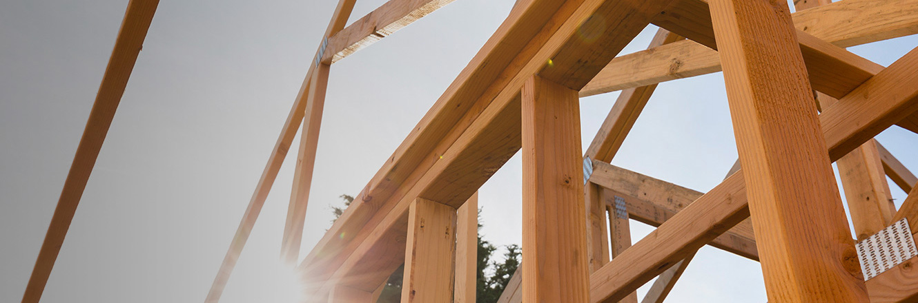 Wooden home or building frame under construction 